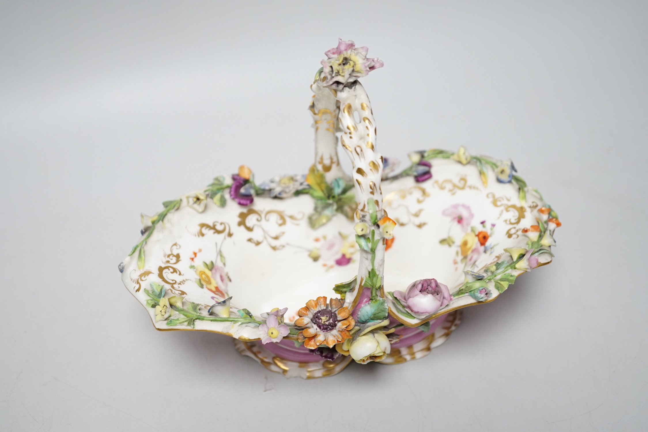 A Grainger Lee and co. miniature pot pourri vase with pierced cover, decorated with a view of Worcester Cathedral and the River Severn, on a blue ground, with two scroll handles and four paw feet and a Coalbrookdale flor